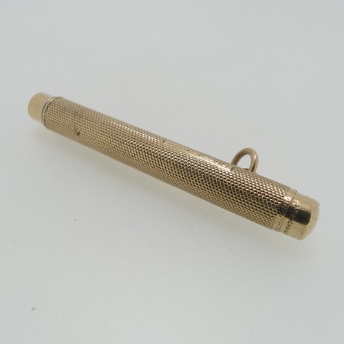 212 - Sampson Mordan; A 9ct gold Propelling Pencil, hallmarked London, 1916, the body with engine turned d... 