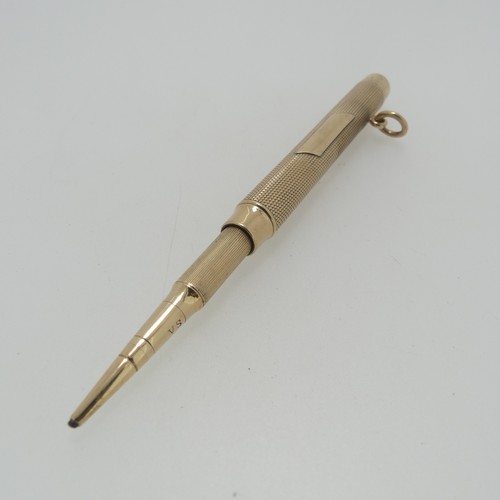 212 - Sampson Mordan; A 9ct gold Propelling Pencil, hallmarked London, 1916, the body with engine turned d... 