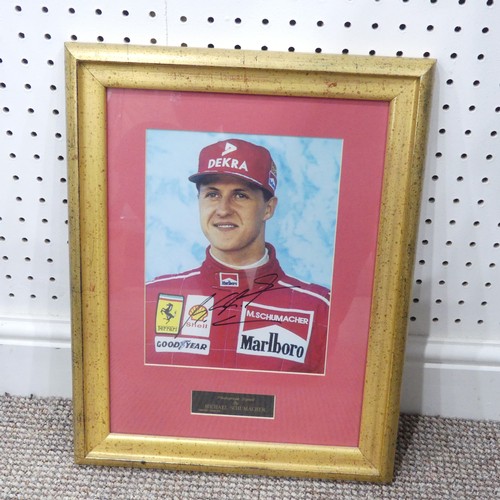 286 - A signed print of Michael Schumacher, together with a signed, limited edition (082 of 250) print 'Wi... 