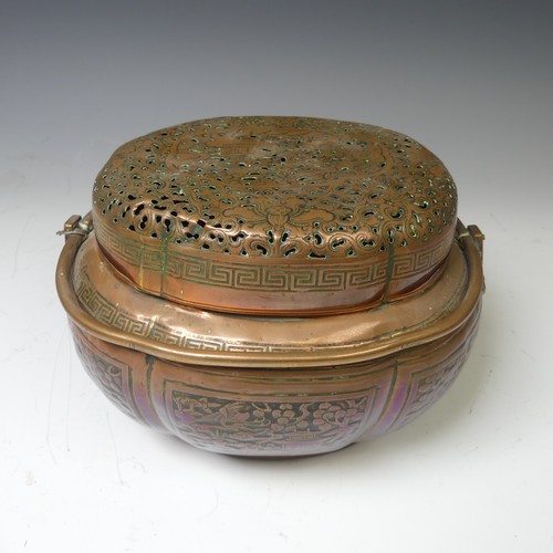 216 - A Chinese copper Hand Warmer, the body of lobed oval form with six panels of decoration depicting bu... 