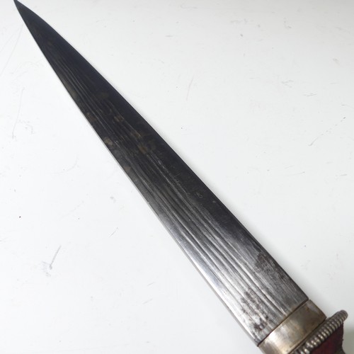 220 - A late 19thC Tibetan / Bhutanese Short Sword, the single edged steel blade with silver wirework grip... 