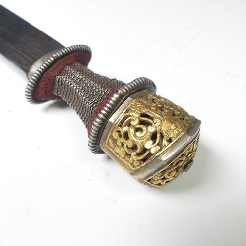 220 - A late 19thC Tibetan / Bhutanese Short Sword, the single edged steel blade with silver wirework grip... 