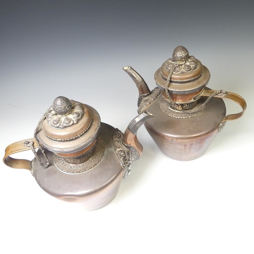 221 - A pair of 19thC Tibetan silver mounted copper ceremonial Teapots, of typical form, the removable dom... 