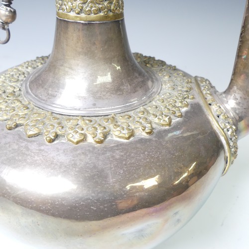 222 - A 19thC Tibetan silver and parcel-gilt ceremonial Teapot / Ewer, the plain tapering circular body wi... 