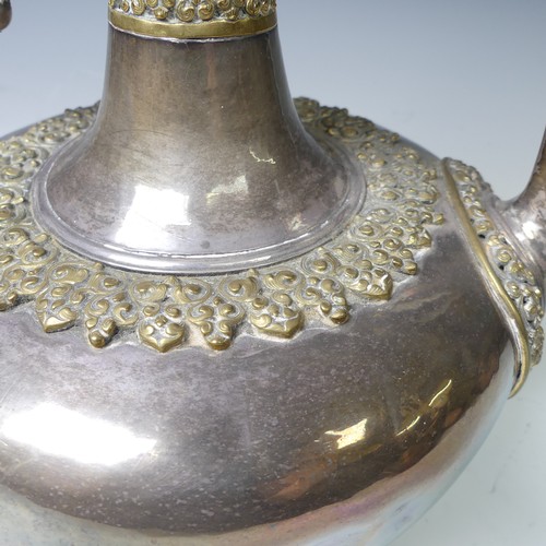 222 - A 19thC Tibetan silver and parcel-gilt ceremonial Teapot / Ewer, the plain tapering circular body wi... 