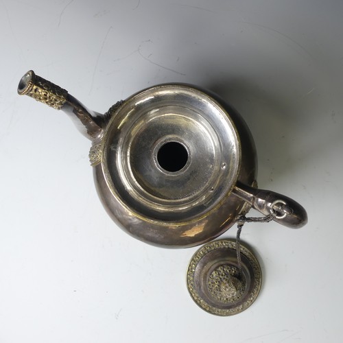 222 - A 19thC Tibetan silver and parcel-gilt ceremonial Teapot / Ewer, the plain tapering circular body wi... 