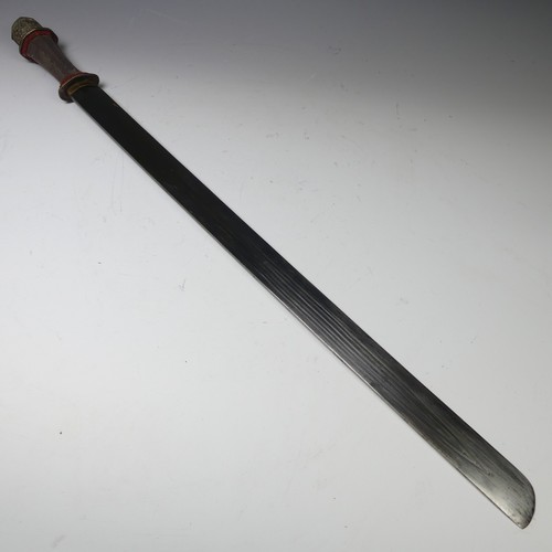 223 - A late 19thC Tibetan Sword, the single edged steel blade with pale shagreen grip and silver pommel, ... 