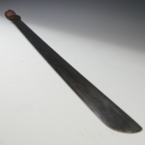 223 - A late 19thC Tibetan Sword, the single edged steel blade with pale shagreen grip and silver pommel, ... 