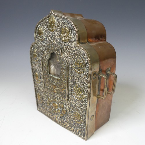 225 - A Tibetan copper, silver and gilt Gau (or G'au), the portable shrine of traditional form, the centra... 