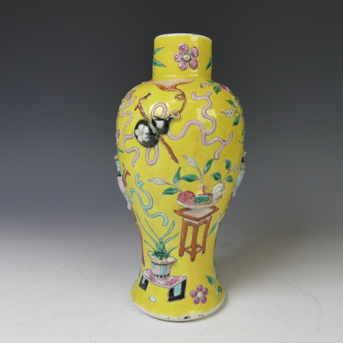 232 - A late 19thC Chinese famille jaune baluster Vase, the yellow ground with enamel decorations in relie... 