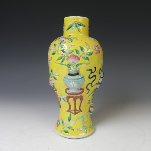 232 - A late 19thC Chinese famille jaune baluster Vase, the yellow ground with enamel decorations in relie... 