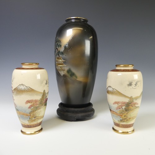 234 - A pair of antique Japanese satsuma Vases, with painted scenes of a mountainous landscape, red and gi... 