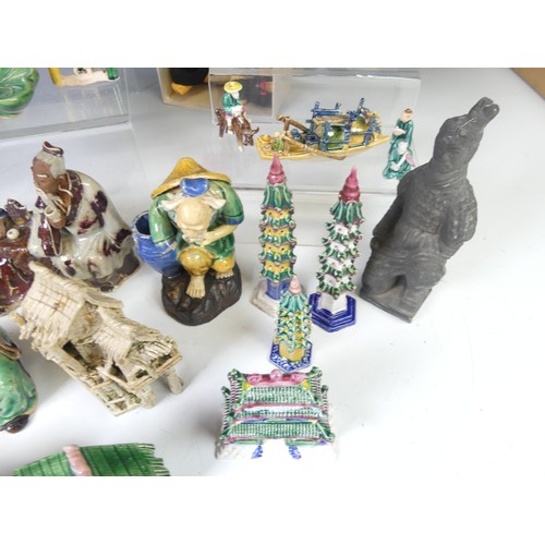 235 - A quantity of miniature Chinese Figures and Buildings, comprising bridges, pagodas, animals, figures... 