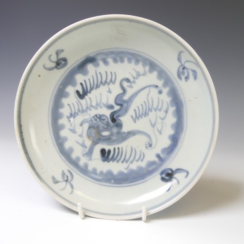 242 - A pair of Nanking cargo porcelain Plates, decorated in blue and white depictions of creatures, with ... 