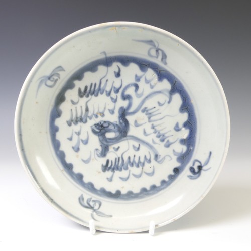 242 - A pair of Nanking cargo porcelain Plates, decorated in blue and white depictions of creatures, with ... 