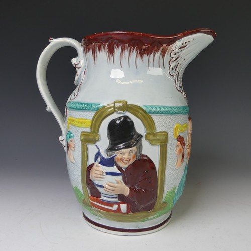 25 - A 19thC prattware pottery Shakespeare Jug, moulded and painted with a bust of Shakespeare, flanked b... 