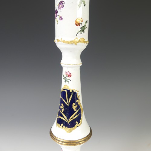 53 - A South Staffordshire enamelled Candlestick, decorated in foliate designs in blues and gilt, with sc... 