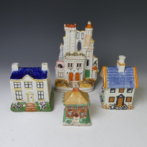 63 - A 19thC prattware Money Box, modelled as a house, together with three other Staffordshire models of ... 