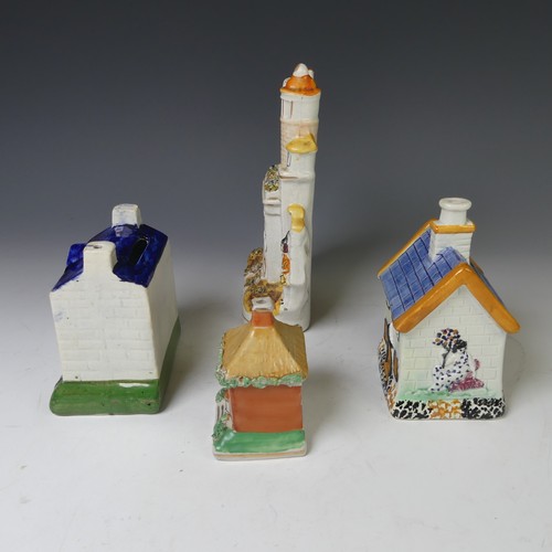 63 - A 19thC prattware Money Box, modelled as a house, together with three other Staffordshire models of ... 