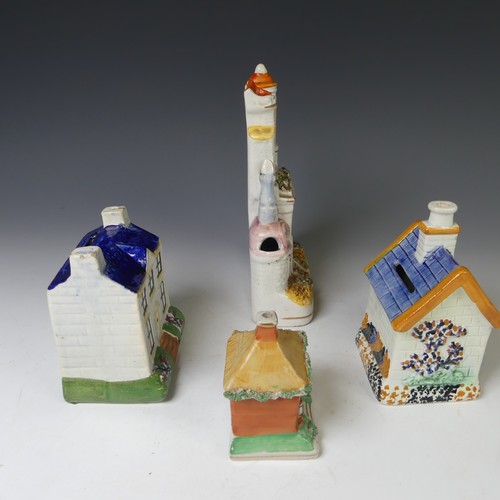 63 - A 19thC prattware Money Box, modelled as a house, together with three other Staffordshire models of ... 