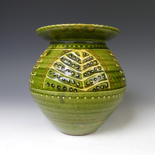 66 - A Harry Juniper pottery Vase, the globular body with flared rim, of green ground with leaf decoratio... 