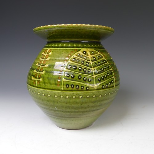 66 - A Harry Juniper pottery Vase, the globular body with flared rim, of green ground with leaf decoratio... 