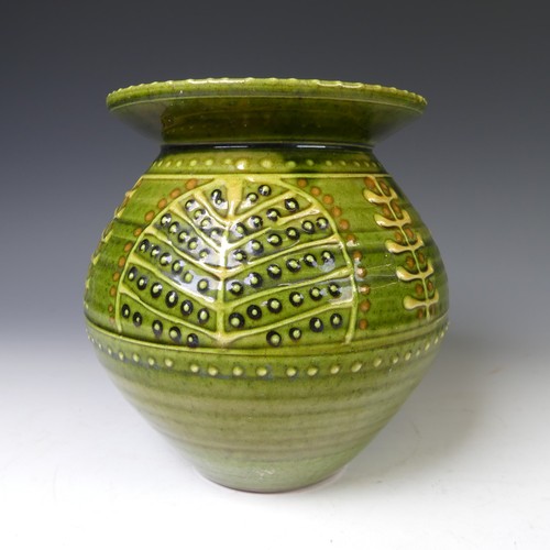 66 - A Harry Juniper pottery Vase, the globular body with flared rim, of green ground with leaf decoratio... 