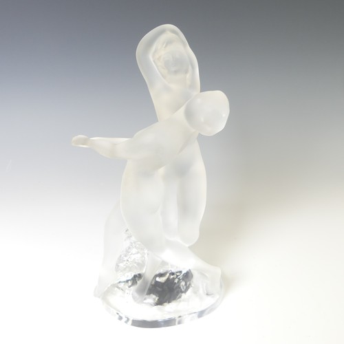 135 - A Lalique frosted glass 'Deux Danseuses' Figure, depicting two dancers intertwined on clear glass ba... 