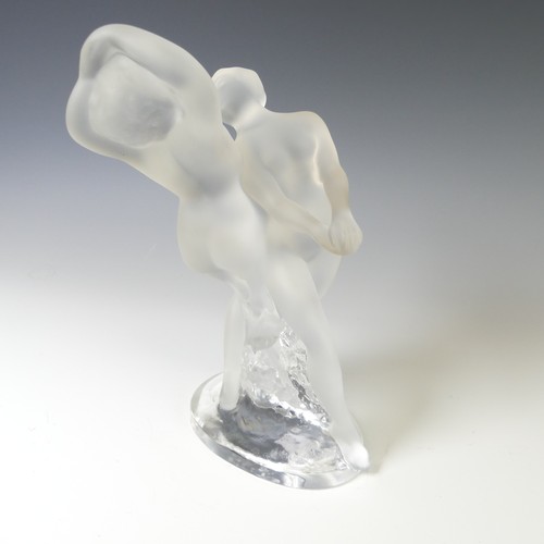 135 - A Lalique frosted glass 'Deux Danseuses' Figure, depicting two dancers intertwined on clear glass ba... 