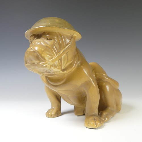 150 - A Royal Doulton WWII British 'Tommy' Bulldog, modelled wearing helmet, chipped,  in seated position,... 