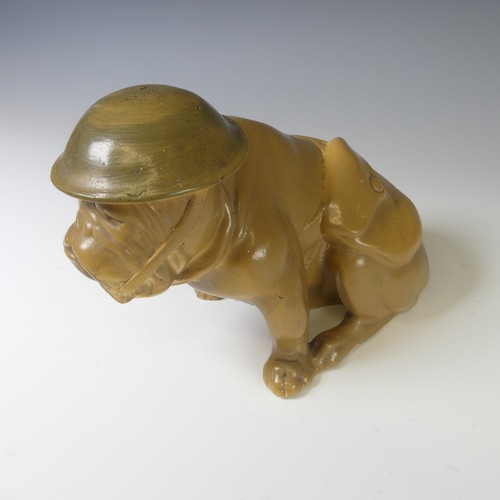 150 - A Royal Doulton WWII British 'Tommy' Bulldog, modelled wearing helmet, chipped,  in seated position,... 