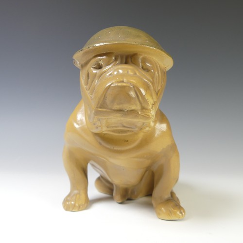 150 - A Royal Doulton WWII British 'Tommy' Bulldog, modelled wearing helmet, chipped,  in seated position,... 