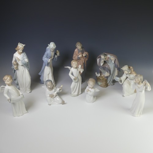 161 - An extensive Lladro and Nao collection of Nativity Figures, comprising Lladro Saint Joseph, Angels, ... 