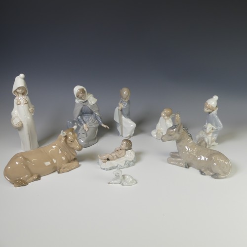 161 - An extensive Lladro and Nao collection of Nativity Figures, comprising Lladro Saint Joseph, Angels, ... 