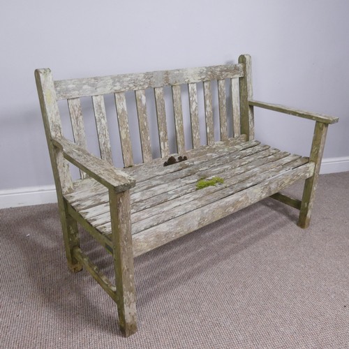 723 - A teak 'Barlow Tyrie' English weathered two seater garden Bench, W 115.5 cm x H 85 cm x D 58 cm.... 