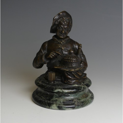 267 - A late 19thC novelty Bronze Desk / Ink Stand, in the form of a jovial man with a bottle under one ar... 