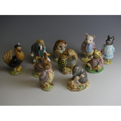 145 - A collection of Beswick Beatrix Potter Figures, comprising Pig-Wig, Mr Jeremy Fisher, Mr Alderman Pt... 