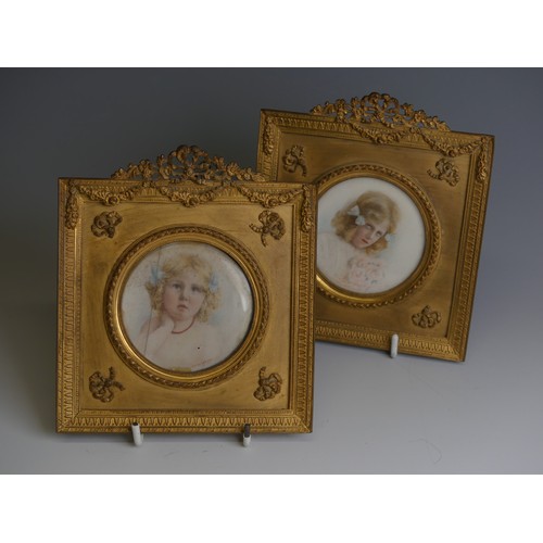 277 - A pair of early 20thC Portrait Miniatures of young girls, watercolour on ivory, indistinctly signed ... 