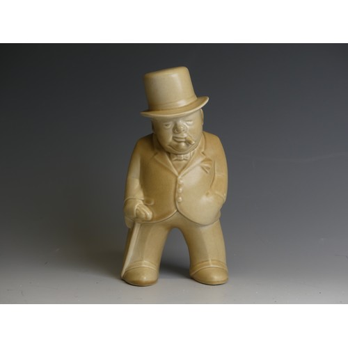 144 - A Bovey Tracey pottery 'Our Gang' figure of Winston Churchill, in oatmeal glaze, factory marks to ba... 