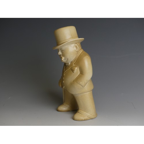 144 - A Bovey Tracey pottery 'Our Gang' figure of Winston Churchill, in oatmeal glaze, factory marks to ba... 