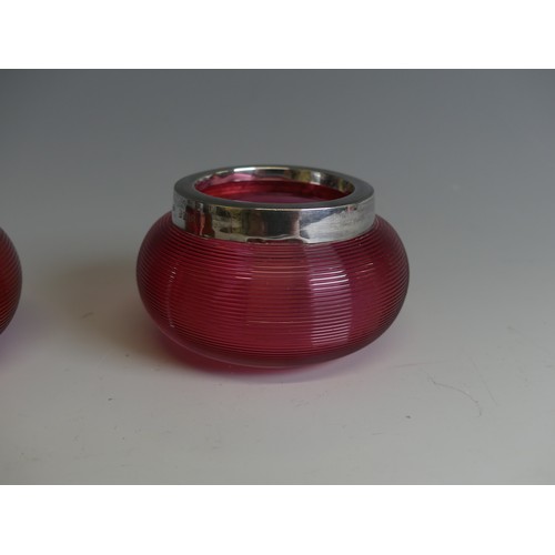 141 - A pair of Edwardian cranberry glass and silver mounted Match Strikers, of squat bulbous form, hallma... 