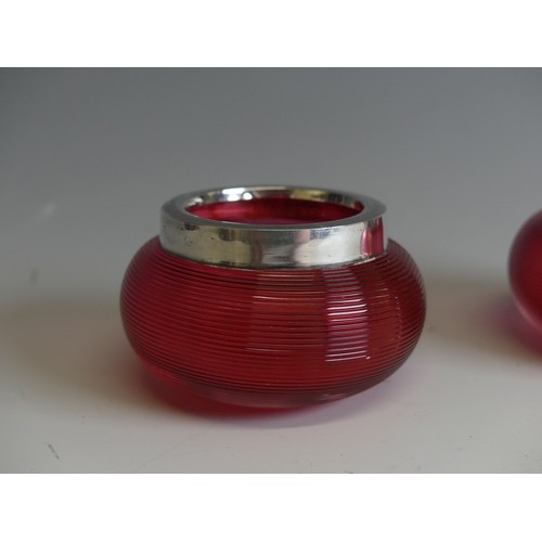 141 - A pair of Edwardian cranberry glass and silver mounted Match Strikers, of squat bulbous form, hallma... 