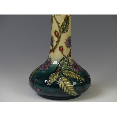 125 - A Moorcroft 'Fiji' pattern Bottle Vase, designed by Emma Bossons, with tubelined decoration, factory... 