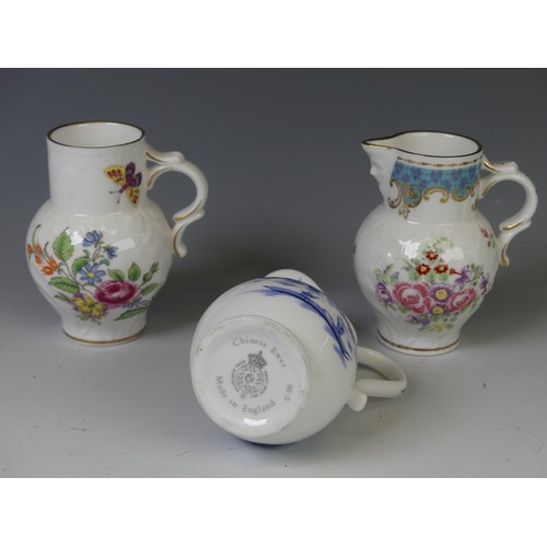 179 - A collection of Royal Worcester reproduction Jugs, comprising Sparrow Beak, Grainger, Cabbage Leaf, ... 