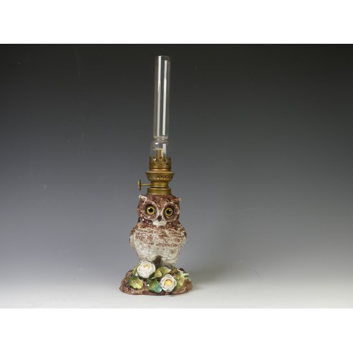 192 - A Victorian porcelain owl oil Lamp Base, c. 1880, the body modelled as an owl perched on flora with ... 