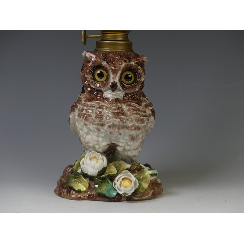 192 - A Victorian porcelain owl oil Lamp Base, c. 1880, the body modelled as an owl perched on flora with ... 