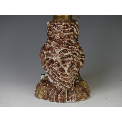 192 - A Victorian porcelain owl oil Lamp Base, c. 1880, the body modelled as an owl perched on flora with ... 