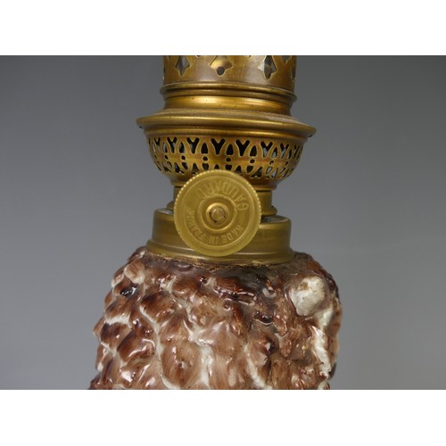 192 - A Victorian porcelain owl oil Lamp Base, c. 1880, the body modelled as an owl perched on flora with ... 