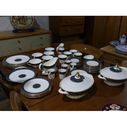 132 - A Royal Doulton 'Carlyle' pattern part dinner Service, comprising six Dinner Plates, five Coffee Can... 