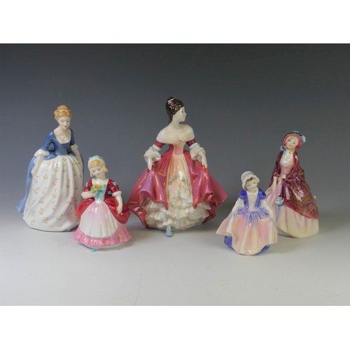 188 - A small quantity of Royal Doulton Figurines, to comprise two 'Paisley Shawl' in varied colourway, 'C... 